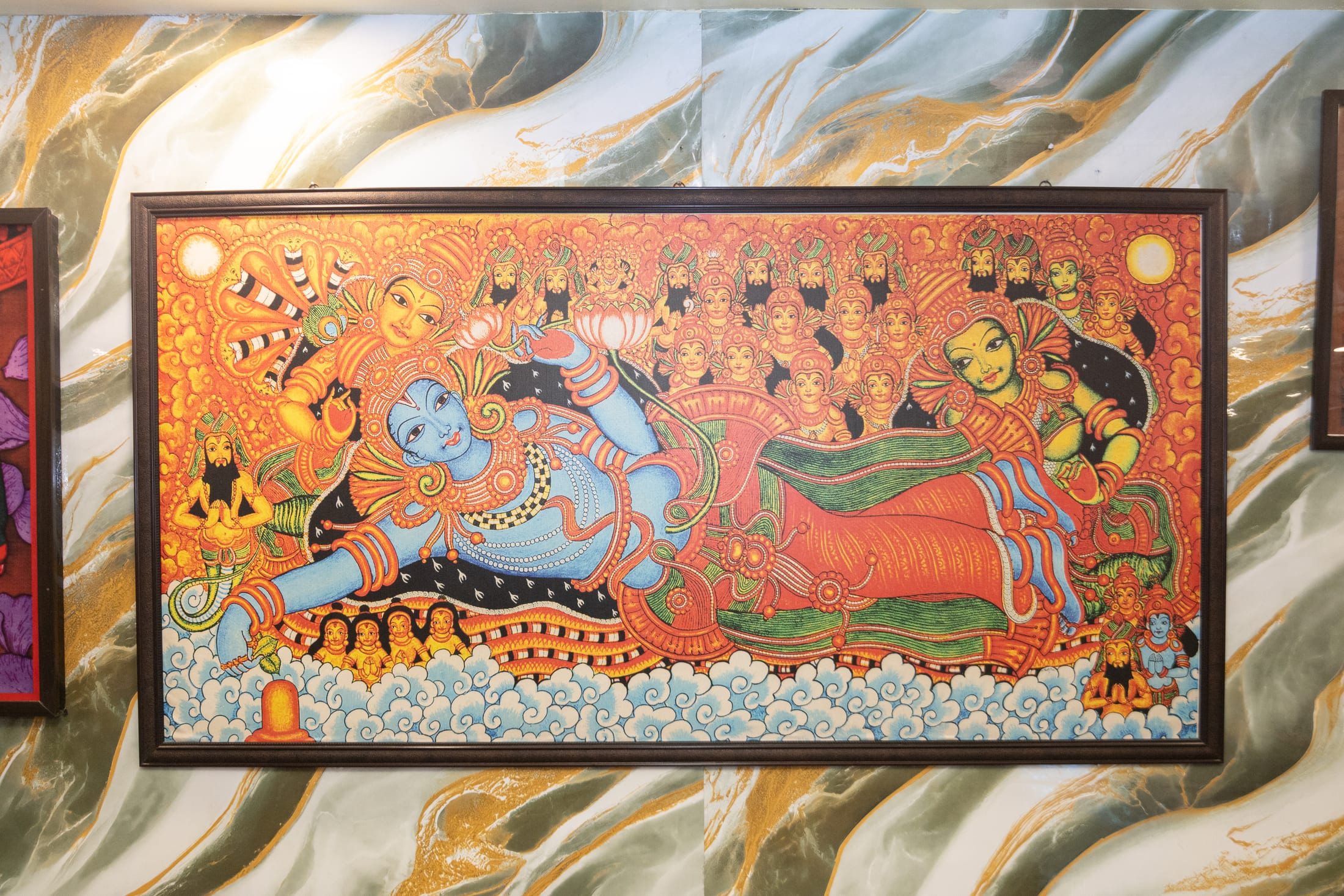Heritage wall art inside Hotel Ellora Silchar